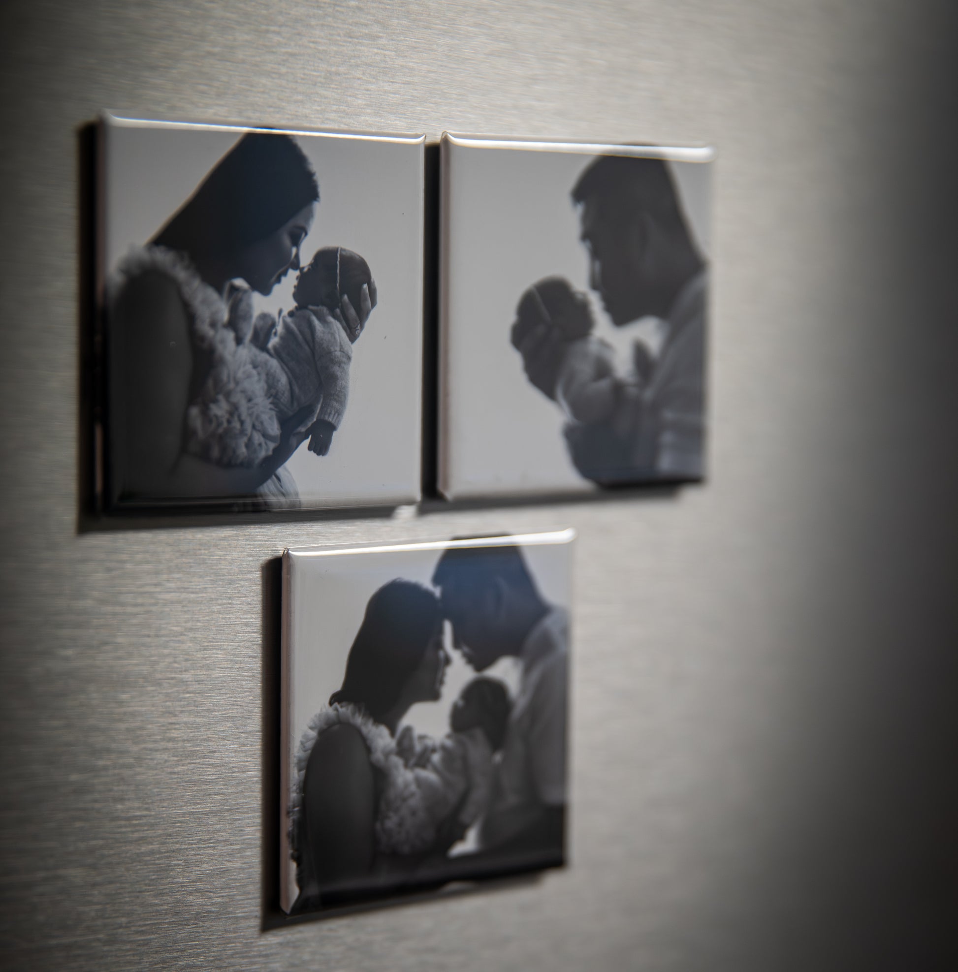 Set of custom square photo magnets displayed on refrigerator with black and white family photos — Simply Love LLC